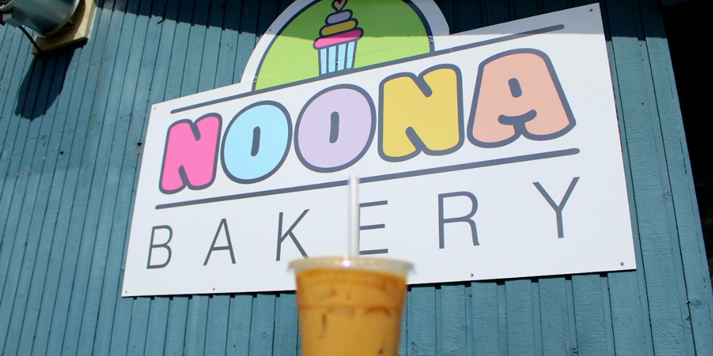 noona bakery sign outside building
