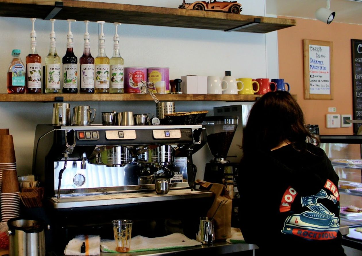 barista working on a coffee